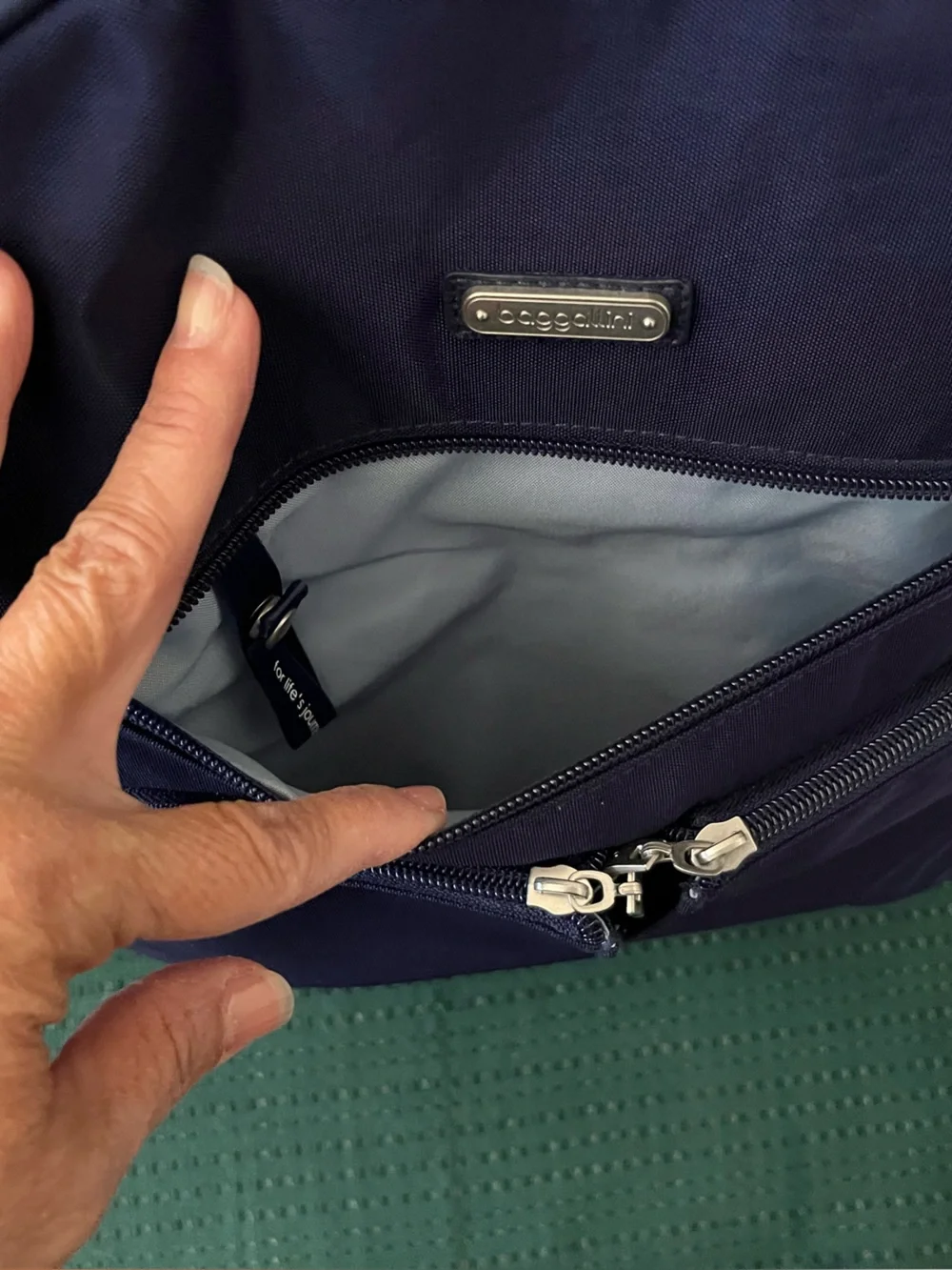 Baggallini Backpack- NWT Color: Navy Blue